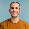 Portrait of a smiling young man with a beard