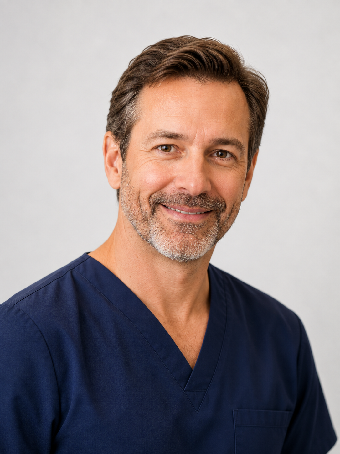 Professional portrait of a male ophthalmologist smiling